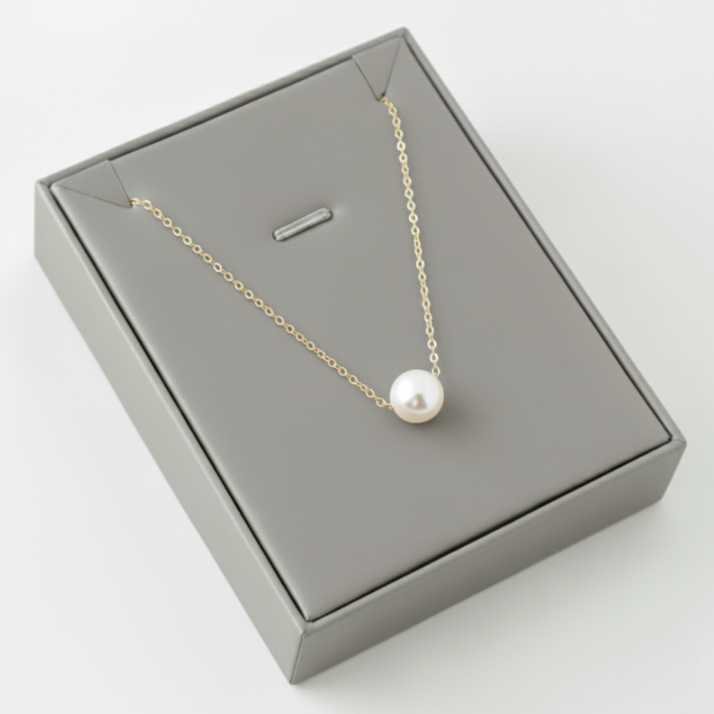 Evelyn – Classic Pearl Bow Pendant Necklace